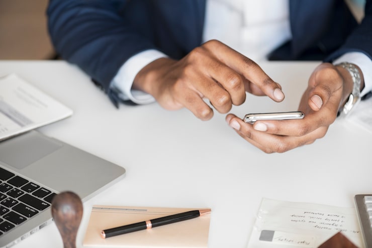 closeup businessman using mobile phone 53876 14789